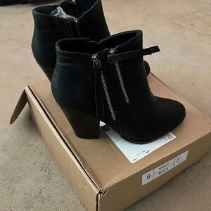 Journey heel ankle boots w/zippers. Brand new in box